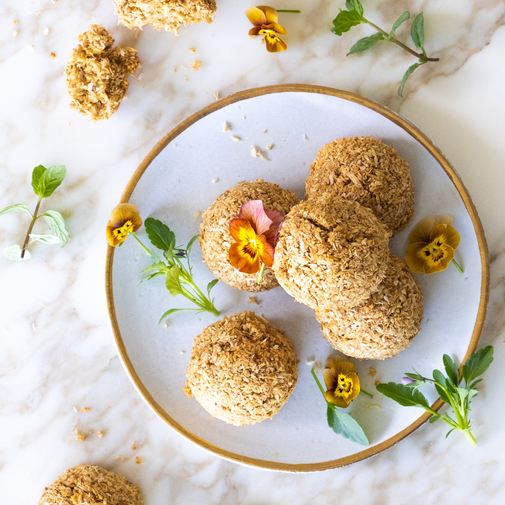 Easy coconut macaroons recipe on white plate with flowers
