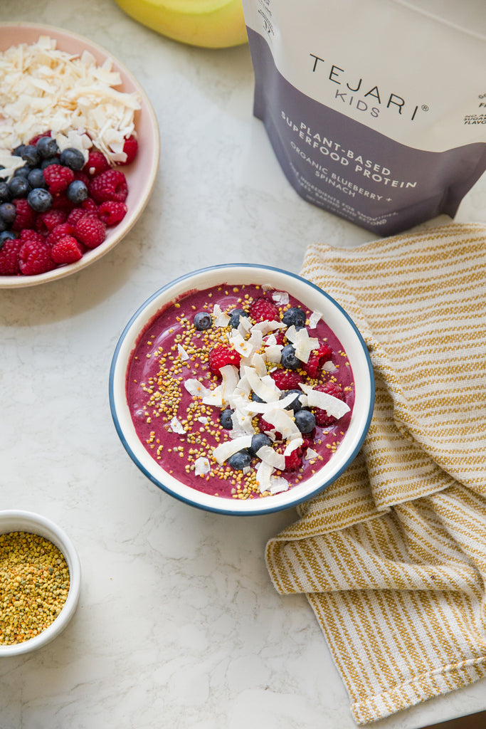 Delicious Setting For Making A Smoothie Bowl Complete, Raspberries, Blueberries and Coconut Shavings