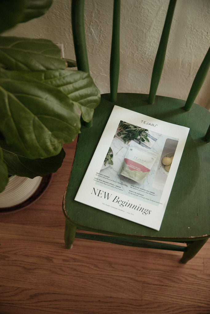 Cool Pic of a Tejari Branded Print Piece on a Green Chair Next to a Green Plant