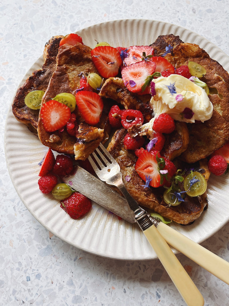 Delicious Breakfast Plate French Toast Sliced Strawberries and Grapes 